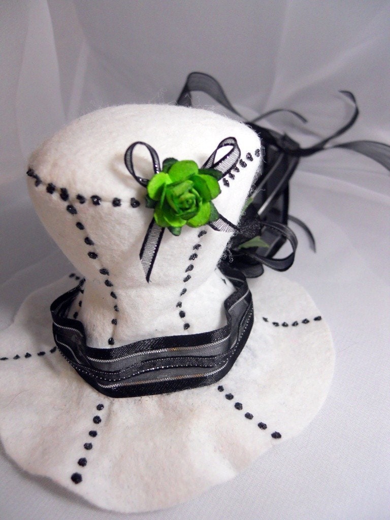 Victorian Envy white mini top hat fascinator with green flowers and black ribbons