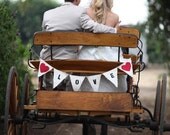 Love photo prop as seen in Gala Wedding Magazine