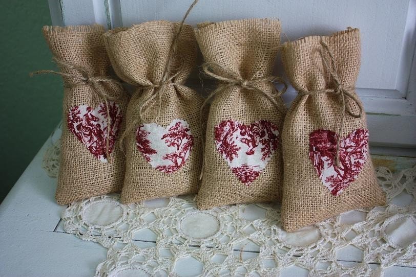 Burlap gift bags with red toil hearts
