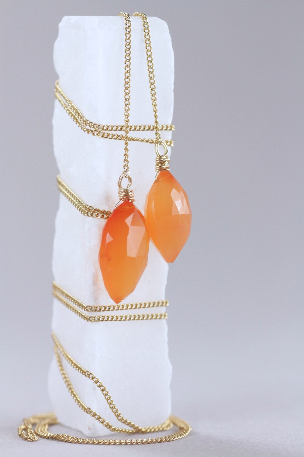 opera length necklace with carnelian drops . kumquat