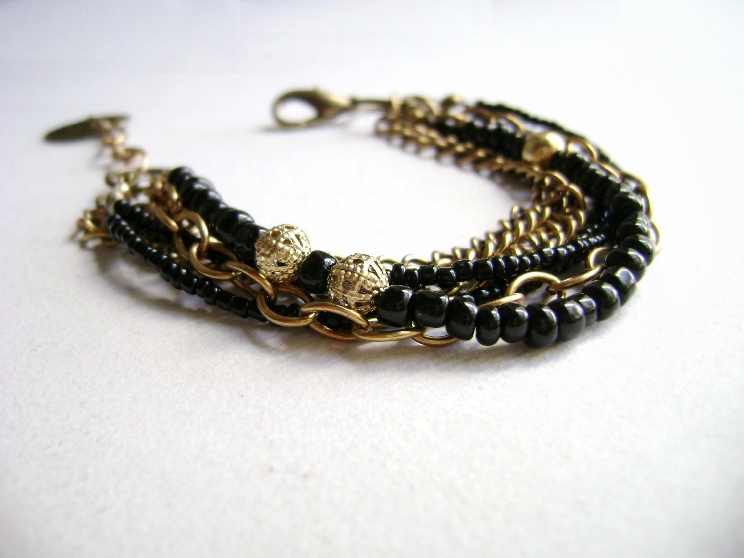 Mystique - Boho style chic black golden bronze stacking chain bracelet etsy fashion