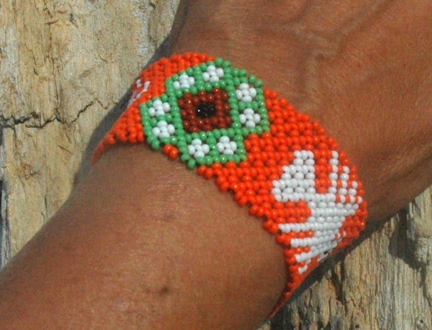 vintage huichol hand beaded eagle bracelet orange