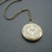 butterfly flower pattern victorian locket - antique brass