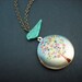 flower tree locket with turquoise bird necklace