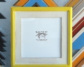 10x10 Square Picture Frame in Vintage White Finish with Vintage Yellow Double Cove Build Up