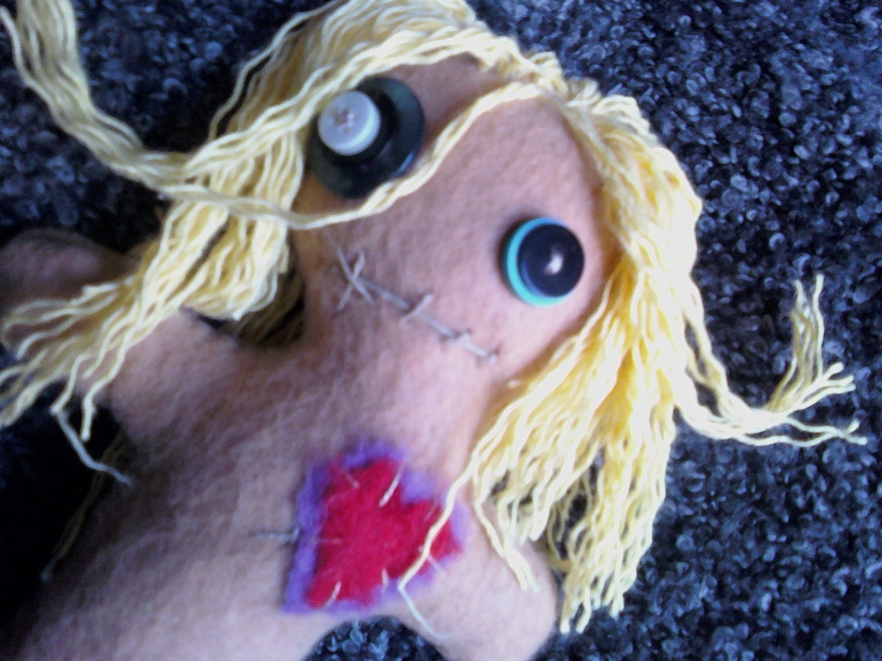 blonde voodoo doll