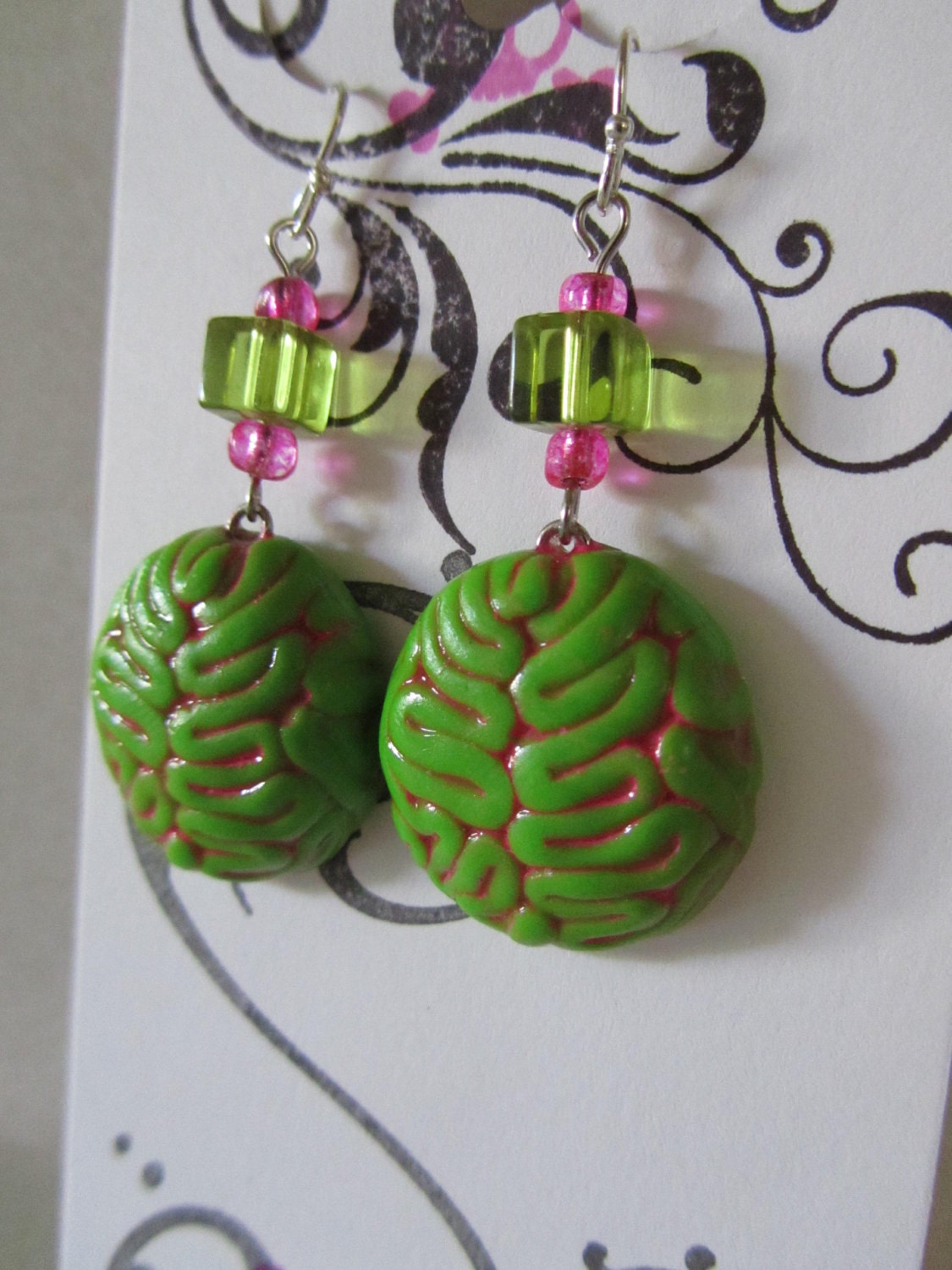 Zombie Brain earrings neon green and pink