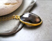 Smokey Quartz Pendant Framed in gold