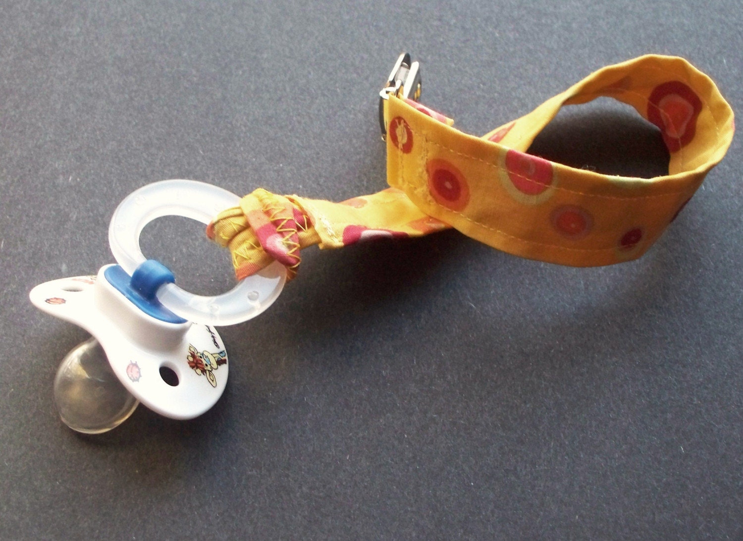 sunrise polkadots pacifier tether