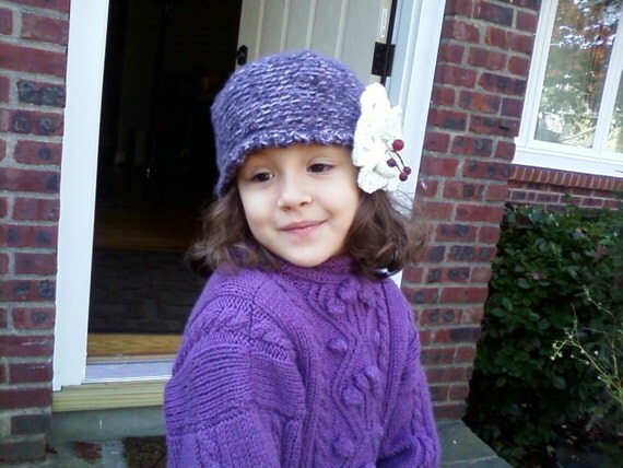Purple Hat with a big white  flower