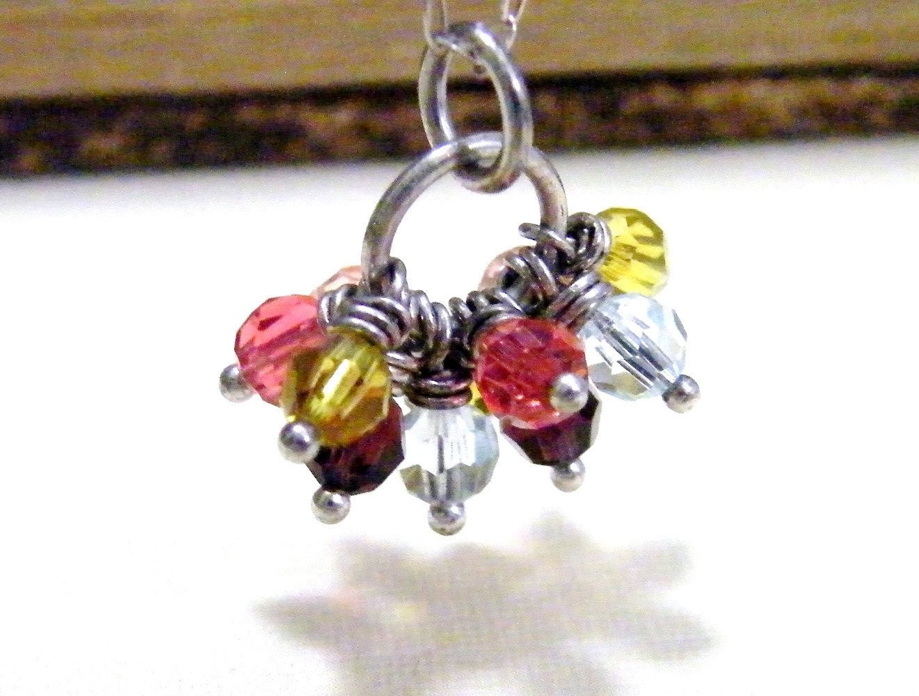 color splash round faceted swarovski crystal link sterling silver necklace of lime, aquamarine, peach, dark brown and fushia