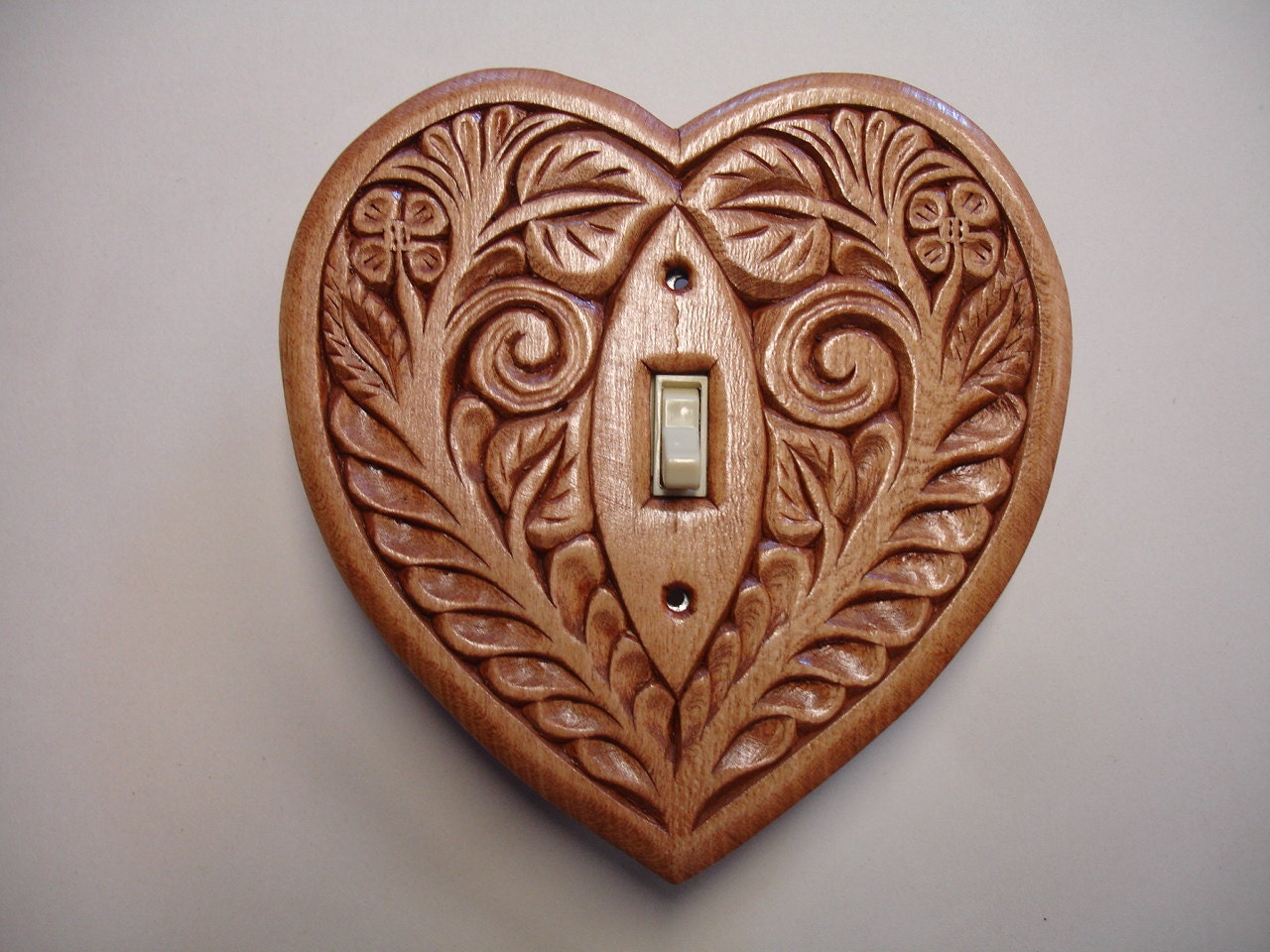 Heart shaped, hand carved wood, electric switch cover plate.