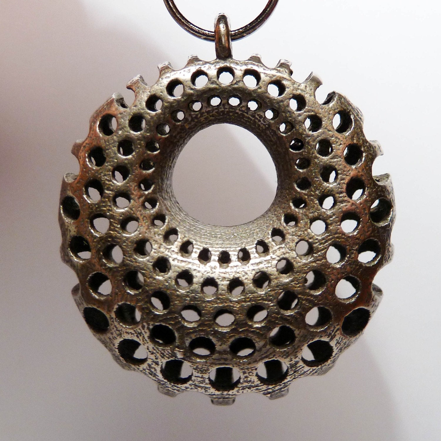 Polyoptic pendant or key fob - 3d printed stainless steel