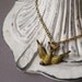 Burnished Yellow Swooping Sparrow Necklace