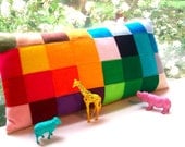 Deliberately  Pixelated.... without the censorship  -  ( a 12 x 24 inches pixelated felt pillow )