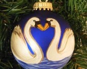 Pair of Swans a Swimming