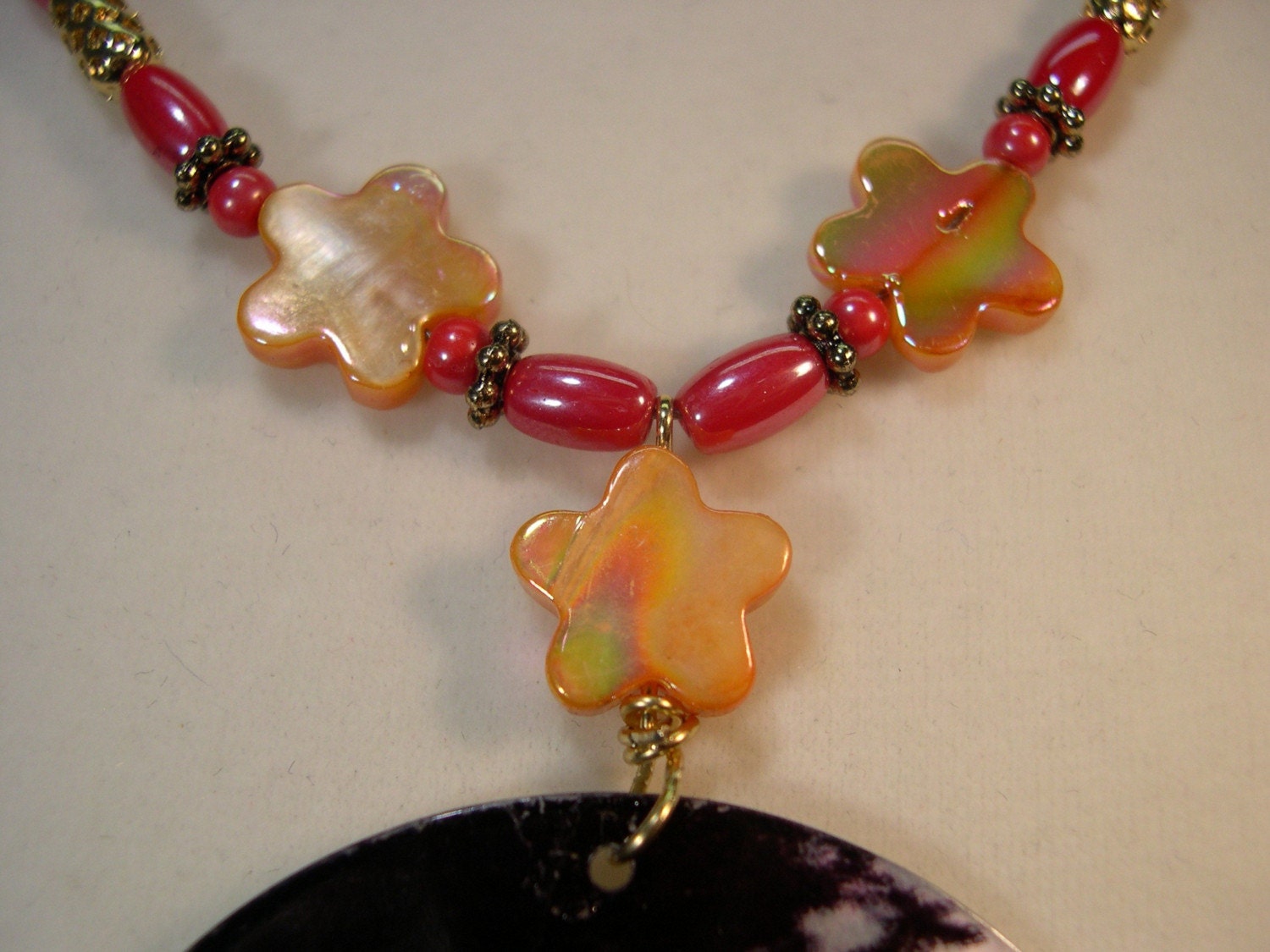 Whimsycle Capiz Shell Medallion Red And Gold Necklace with Child Blowing Bubbles