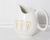 Vintage Harmony House Creamer: Flourish Pattern, White and Blue Speckled Cream Pitcher with Mod Yellow Design