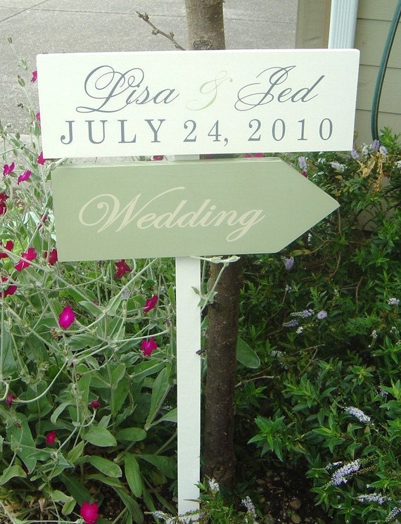 Personalized Wood Directional Signs with Arrow. This sign was featured in the May/June 2011 Issue of Destination Weddings and Honeymoons.