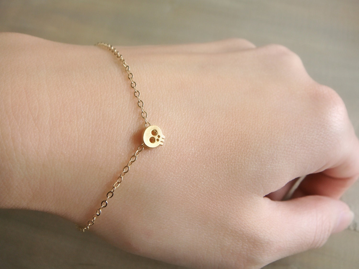 Tiny Skull Bracelet in Gold