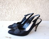 Cute vintage sling back heels with beaded front bows