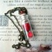 Enchanted Rose Beauty and the Beast Glass Vial Pendant