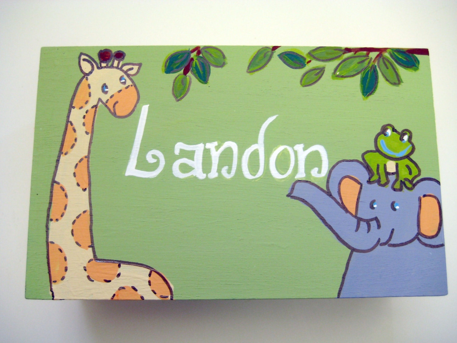 A jungle themed keepsake box,personalized and customized to match bedding