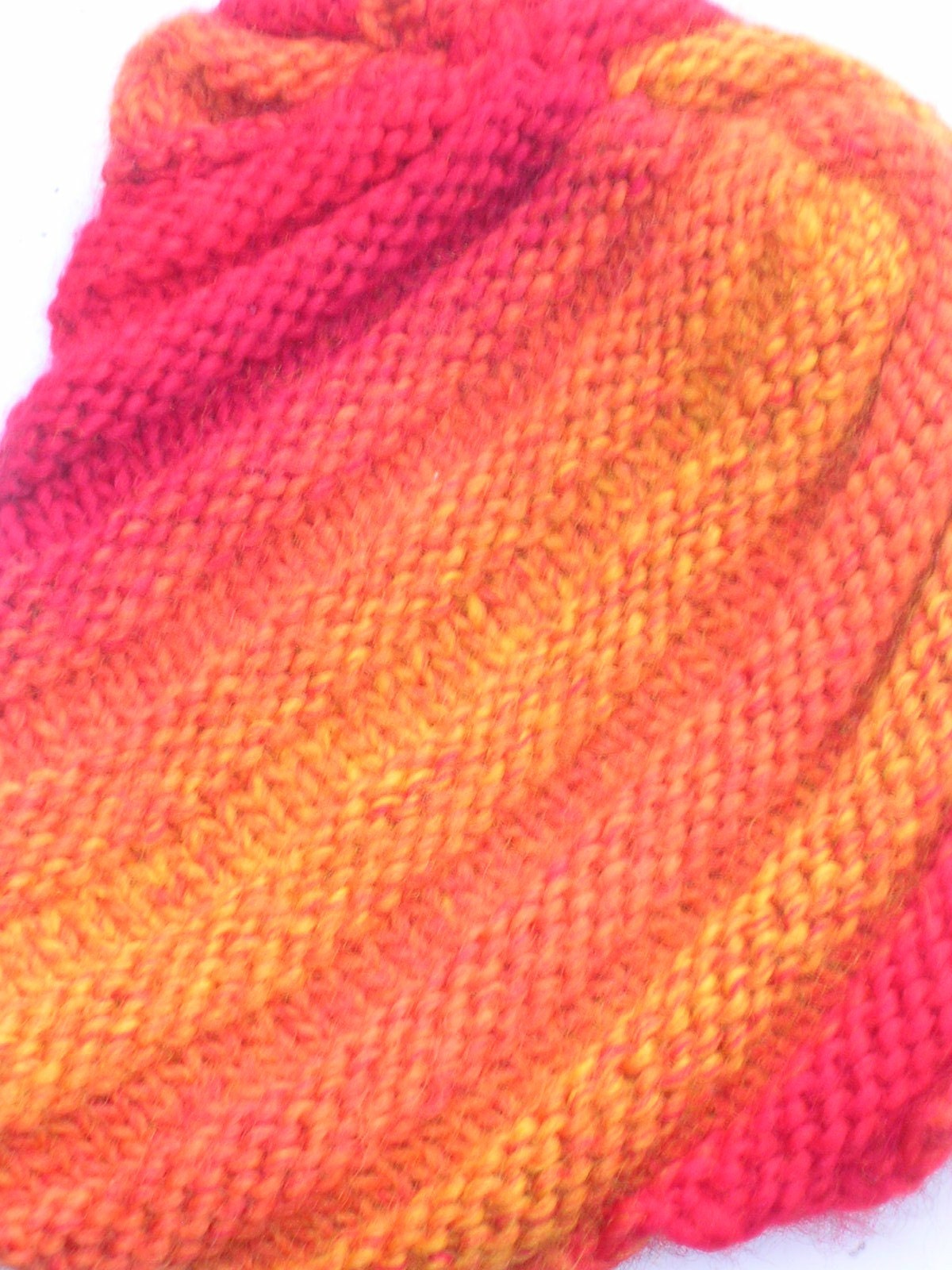 Handknit Orange Sherbet and Red Spiral Wool Hat