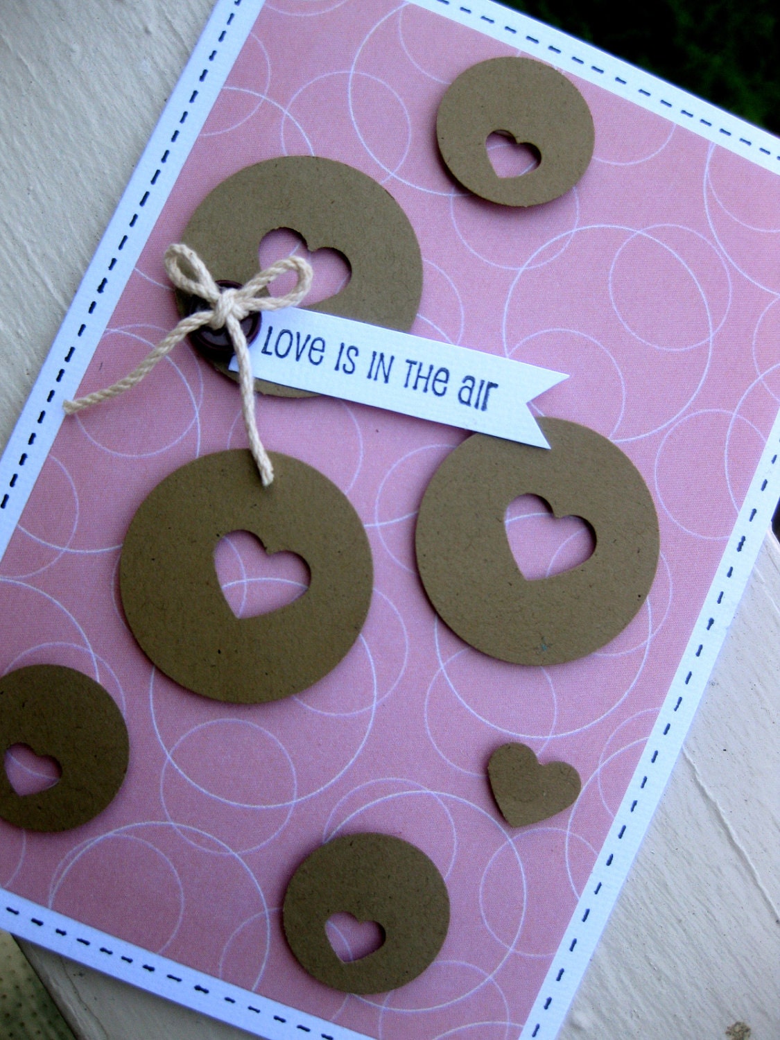 Love is in the air greeting card