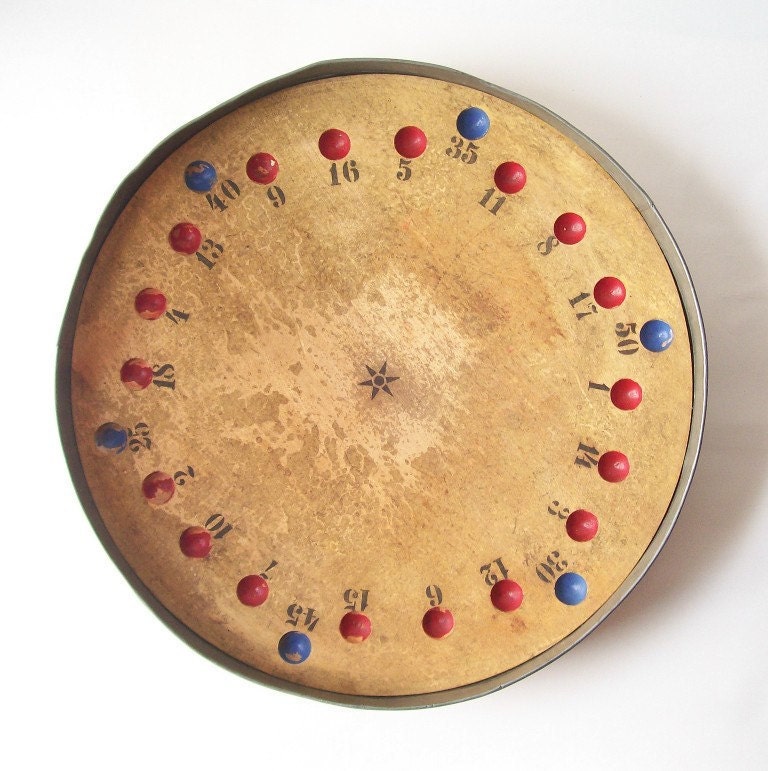 vintage roulette wheel folk art mid century modern rustic fortune spin home decor yellow red blue dots