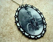 skeletal bicycle framed necklace