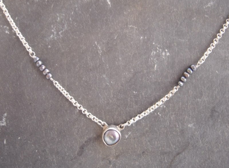 black pearl disc on sterling silver chain