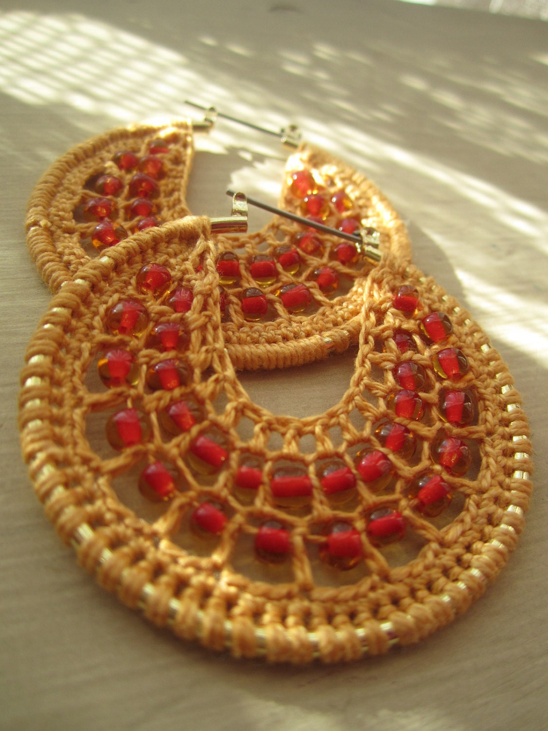Crocheted hoops with beads in Yellow