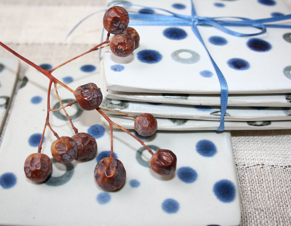 Set of four coasters in blue and white
