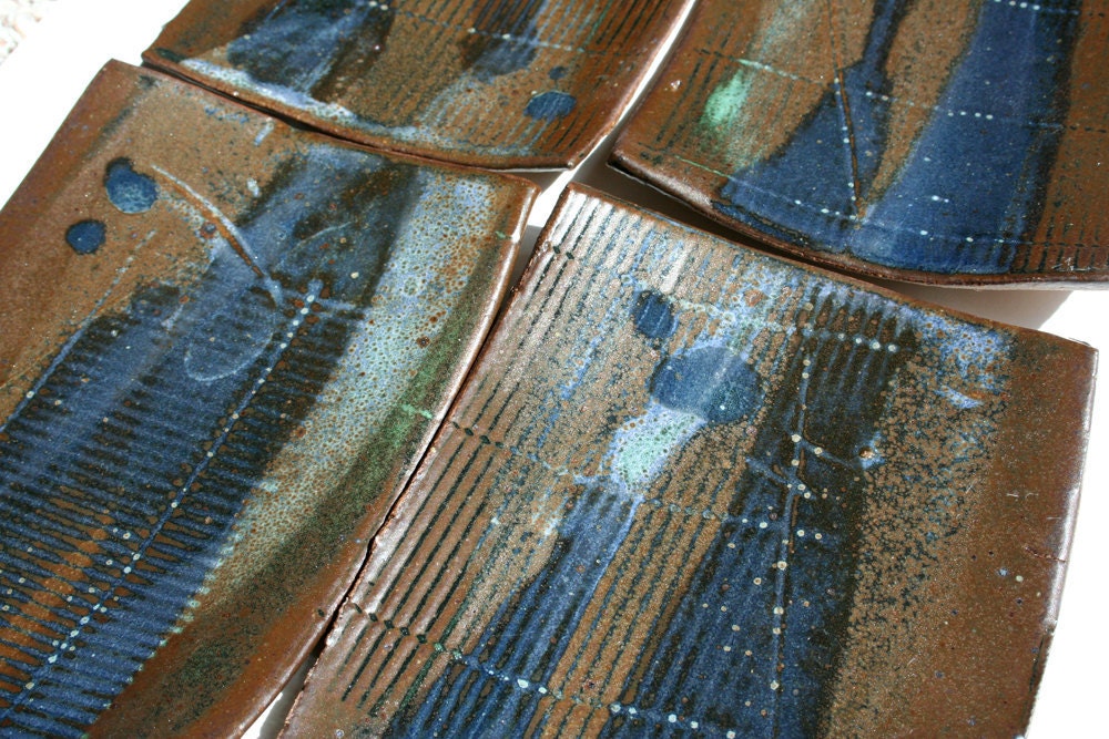 Set of four small rectangular plates