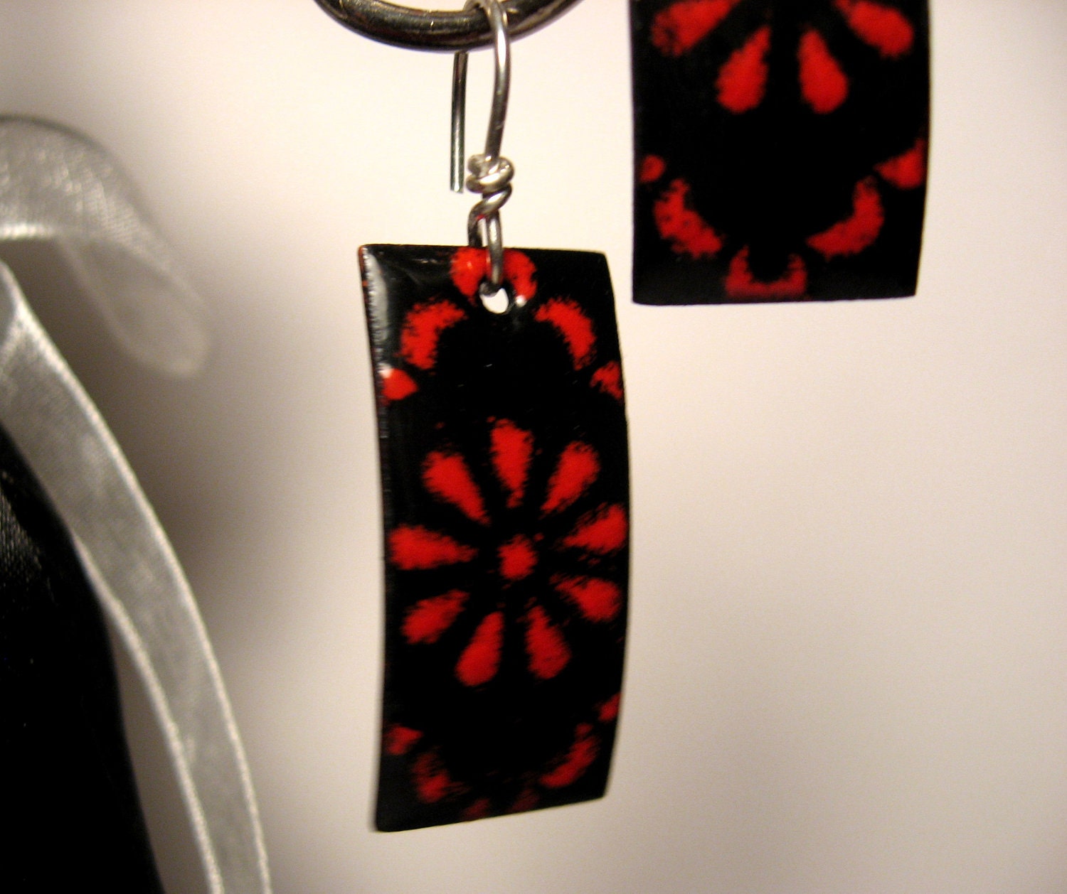 Copper and sterling enameled earrings in red and black