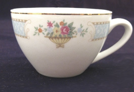 MADE VINTAGE by markings  CHINA MAKERS vintage WITH tea WrappedRoundMyFinger cup CUP IN TEA