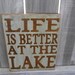 Life is better at the Lake - primitive subway sign