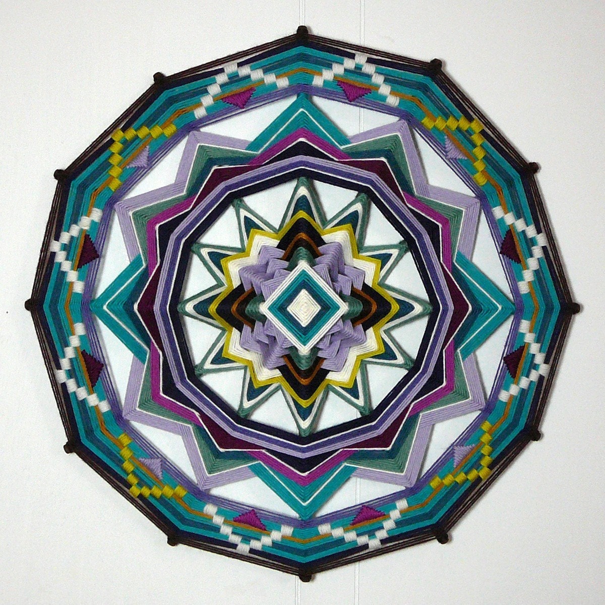 Truth in Beauty, an 18 inch, all wool Ojo de Dios, by custom order