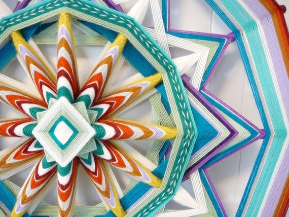 Unbroken Circle, an 24 inch, 12 sided, Ojo de Dios mandala, by Jay Mohler