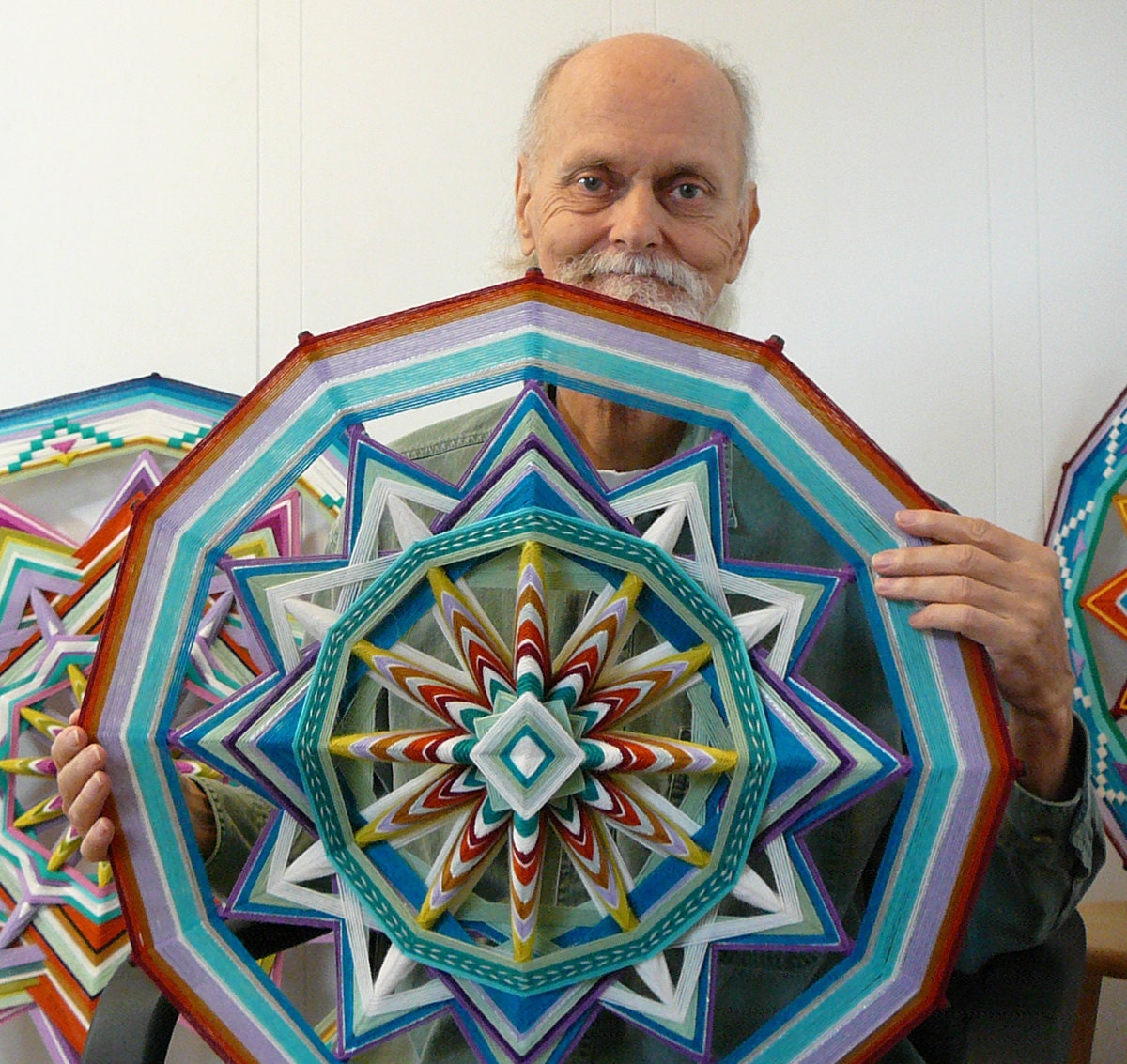 Unbroken Circle, an 24 inch, 12 sided, Ojo de Dios mandala, by Jay Mohler