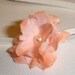 Baby Girl Headband...Tiny Peach Flower on a skinny elastic White Headband...Newborn Headband...Tiny Flower Headband