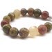 Unakite bracelet with Goldstone and Jade faceted beads