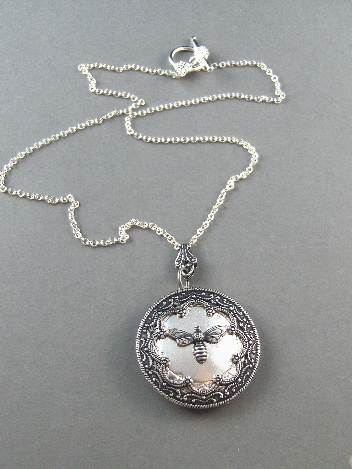Queen Bee Silver Locket. Antiqued Silver,Charm,Wings,Honey,Mother. Handmade jewelery by valleygirldesigns on Etsy.