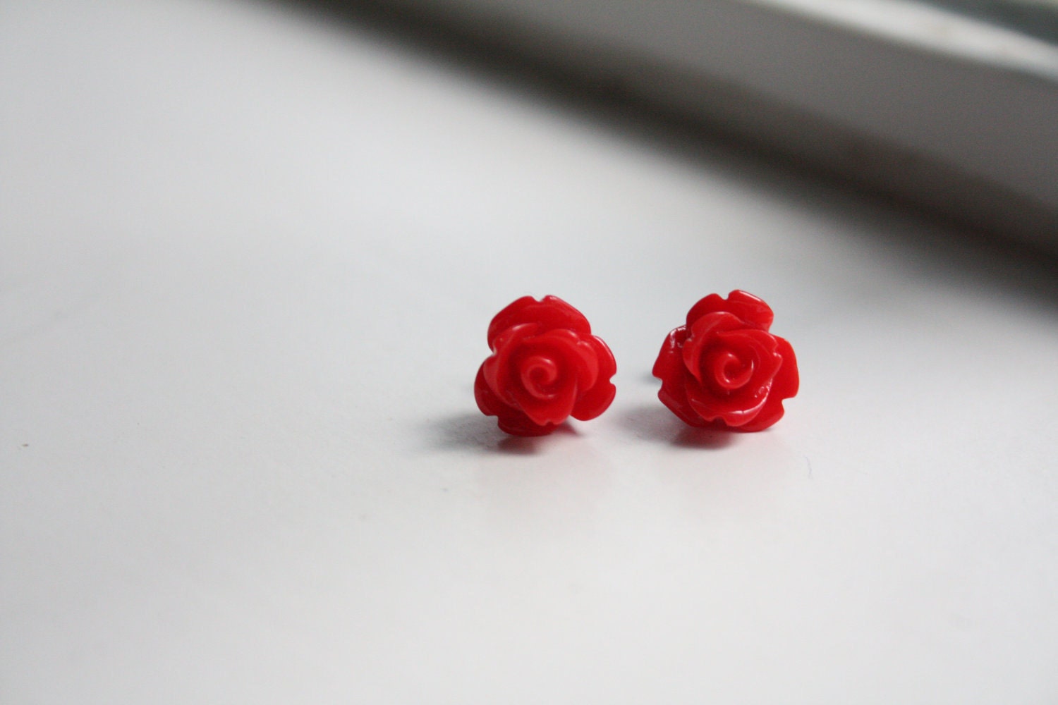 SALE // love me for me red rosebud earrings.