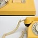 Vintage yellow rotary phone