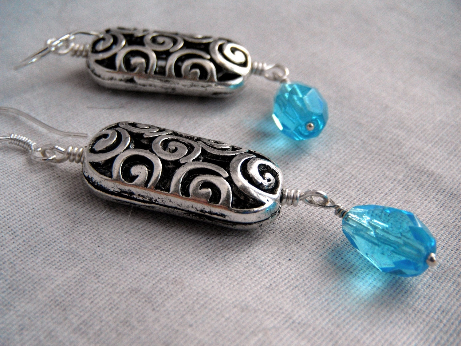 Tibetan Silver Swirl Earrings with Aquamarine Crystals
