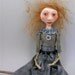 Folk Art doll sculpted cloth and clay strawberry blonde hair bead jointed limbs