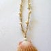 Sunrise Shell on Gold Braided Cord with Pearls and Apatite