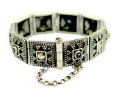 Sterling silver and yellow gold bracelet with blue saphire corundum stones - Against all odds.